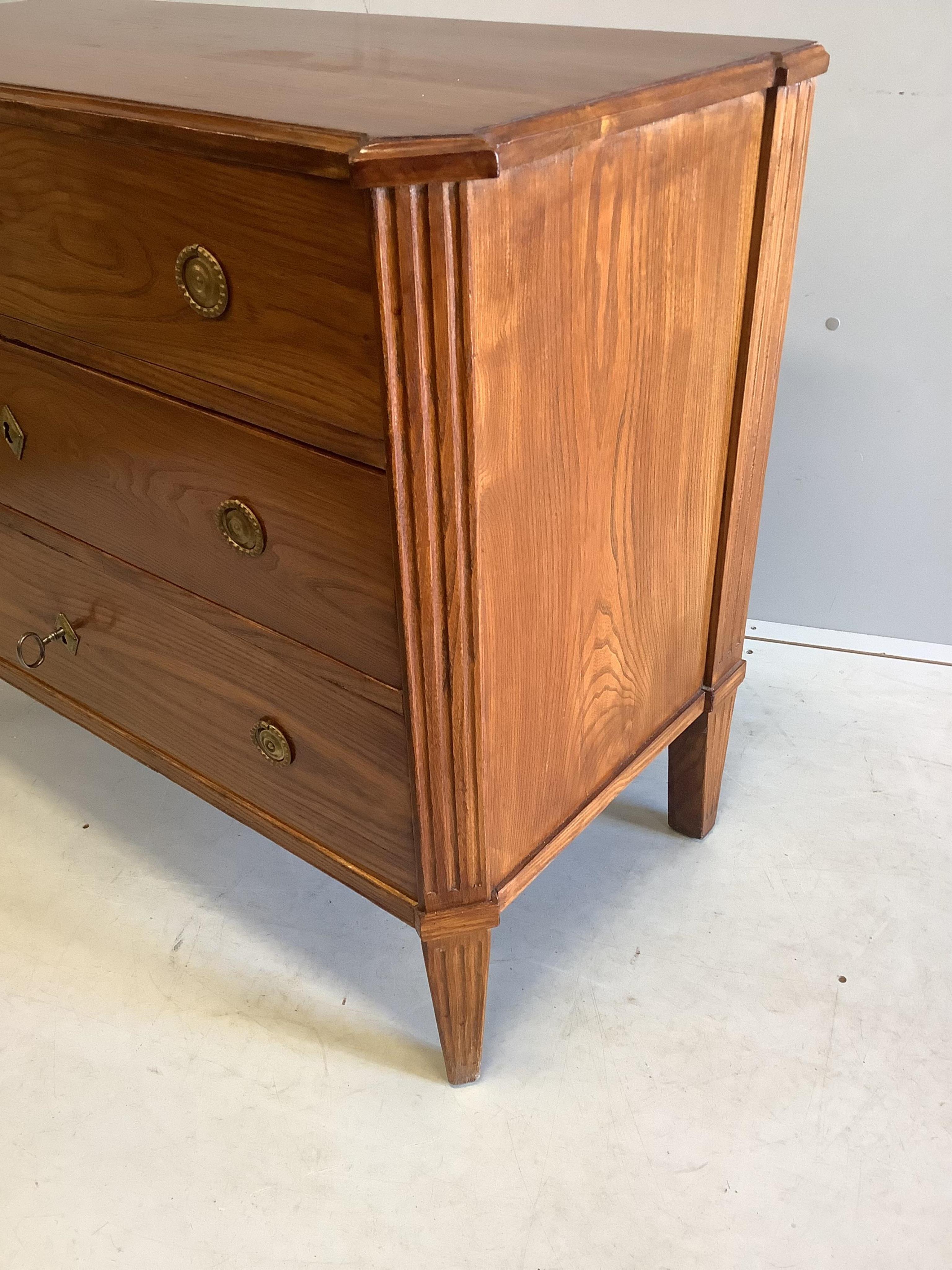 A 19th century Continental elm three drawer commode, width 99cm, depth 49cm, height 83cm. Condition - fair